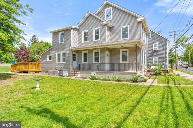 a front view of a house with swimming pool