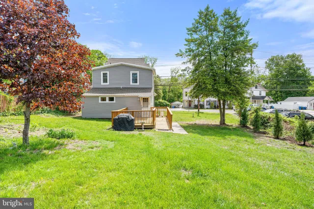 a view of a house with a back yard