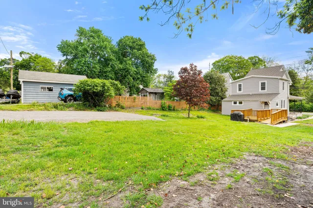 a view of a house with a big yard