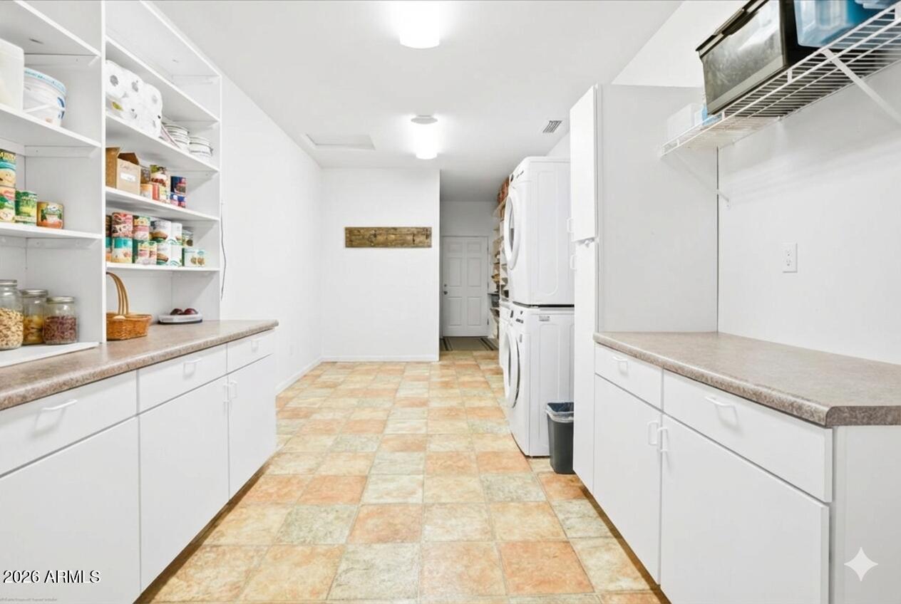 1980 Koch Ranch Road Cornville, AZ 86325 - Photo 12 of 41 a bathroom with a granite countertop sink a toilet and a shower