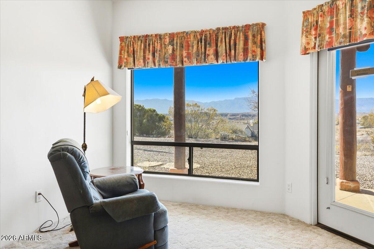 1980 Koch Ranch Road Cornville, AZ 86325 - Photo 14 of 41 a view of a living room filled with furniture and window