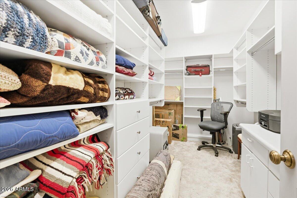 1980 Koch Ranch Road Cornville, AZ 86325 - Photo 18 of 41 a bed room with a bed and a window