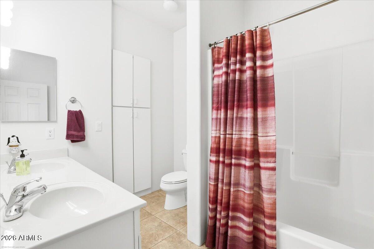 1980 Koch Ranch Road Cornville, AZ 86325 - Photo 19 of 41 a bathroom with a sink toilet and shower