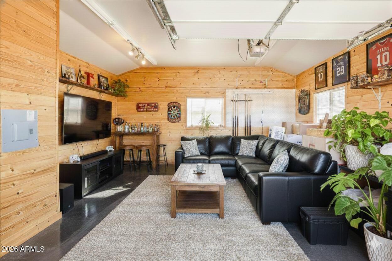 1980 Koch Ranch Road Cornville, AZ 86325 - Photo 28 of 41 a living room with furniture and a flat screen tv