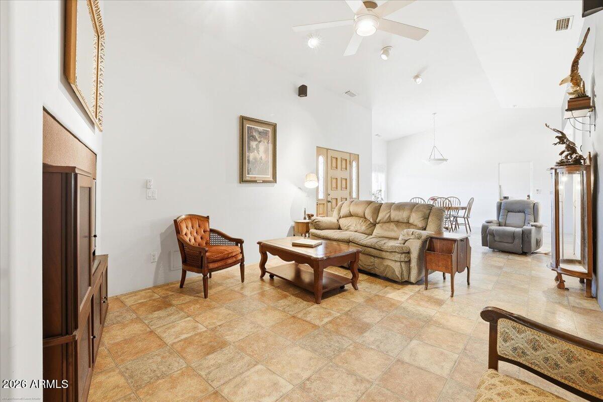 1980 Koch Ranch Road Cornville, AZ 86325 - Photo 7 of 41 a living room with furniture and a flat screen tv