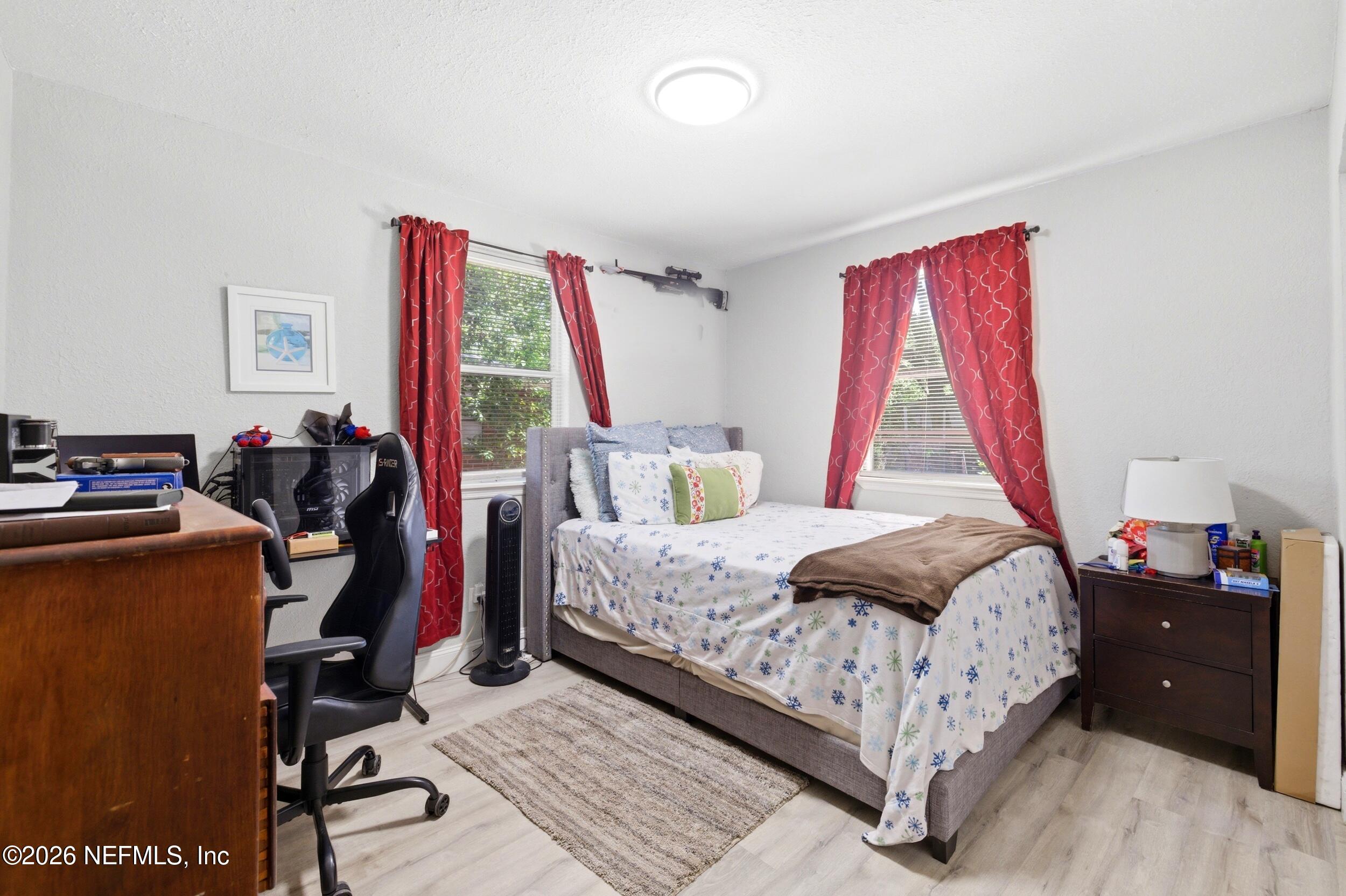 1955 Layton Road Jacksonville, FL 32211 - Photo 26 of 35 a bedroom with a bed and a window