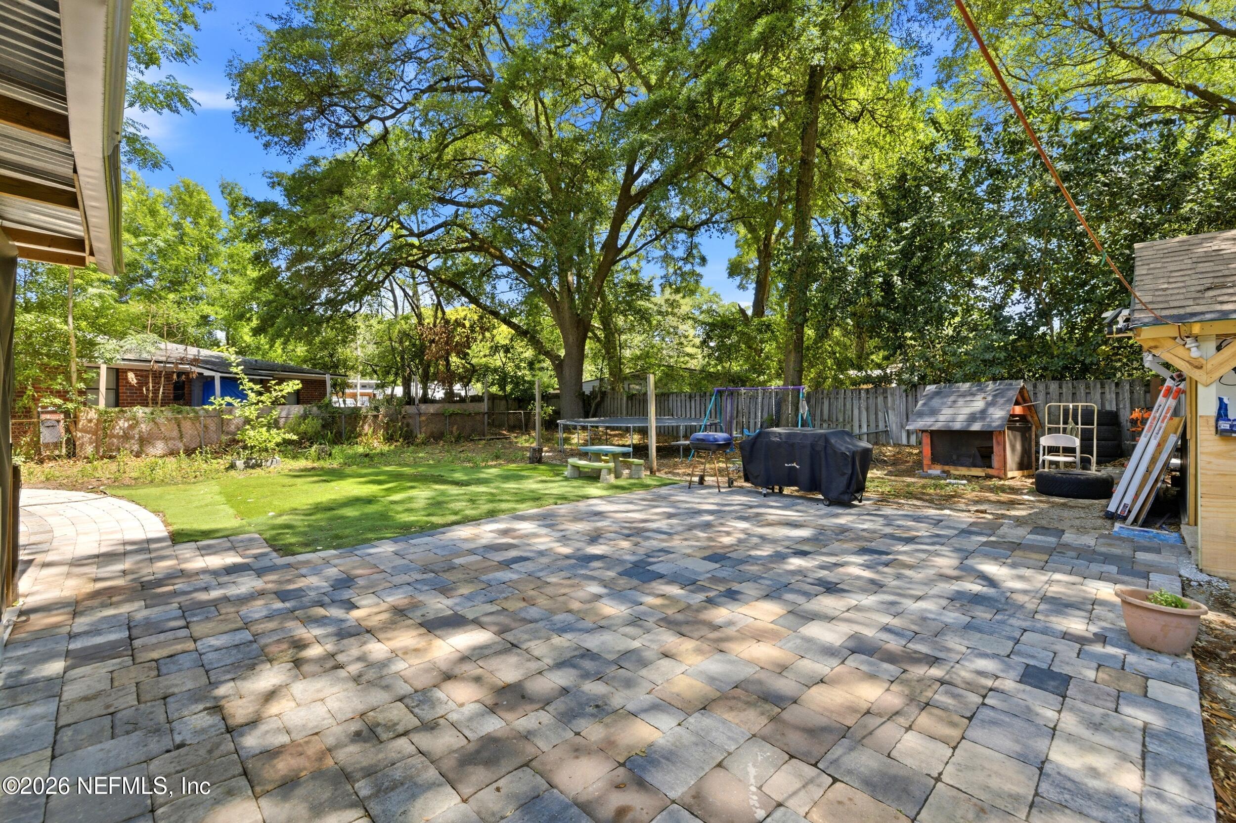 1955 Layton Road Jacksonville, FL 32211 - Photo 31 of 35 a view of a house with backyard and sitting area