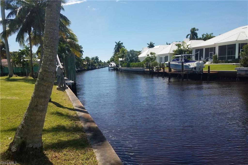 930 18th Avenue South Naples, FL 34102 - Photo 11 of 16 a view of a lake with houses