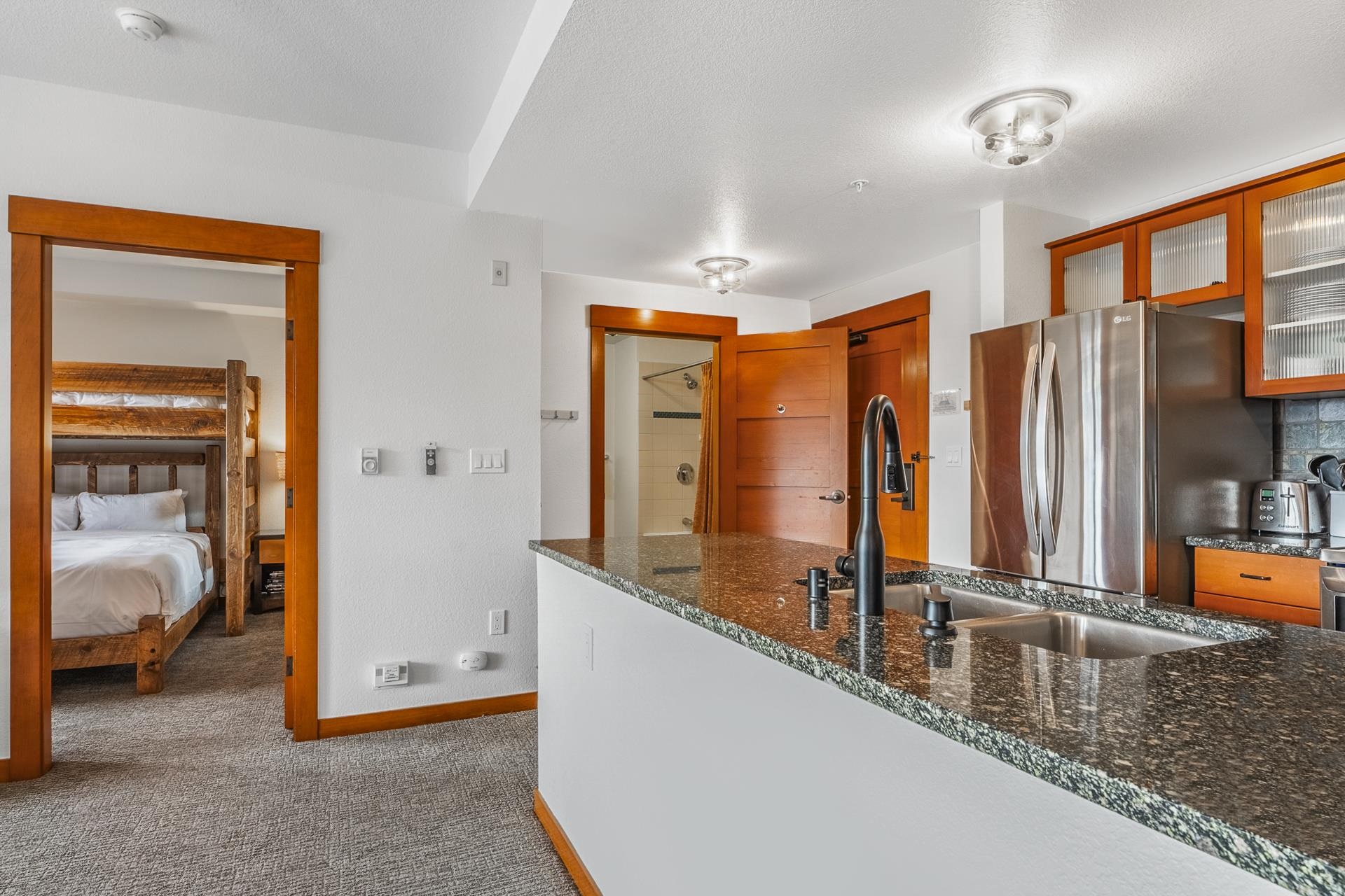 6201 Minaret Road, Unit 2311 Mammoth Lakes, CA 93546 - Photo 11 of 40 a view of living room with furniture and a bathroom