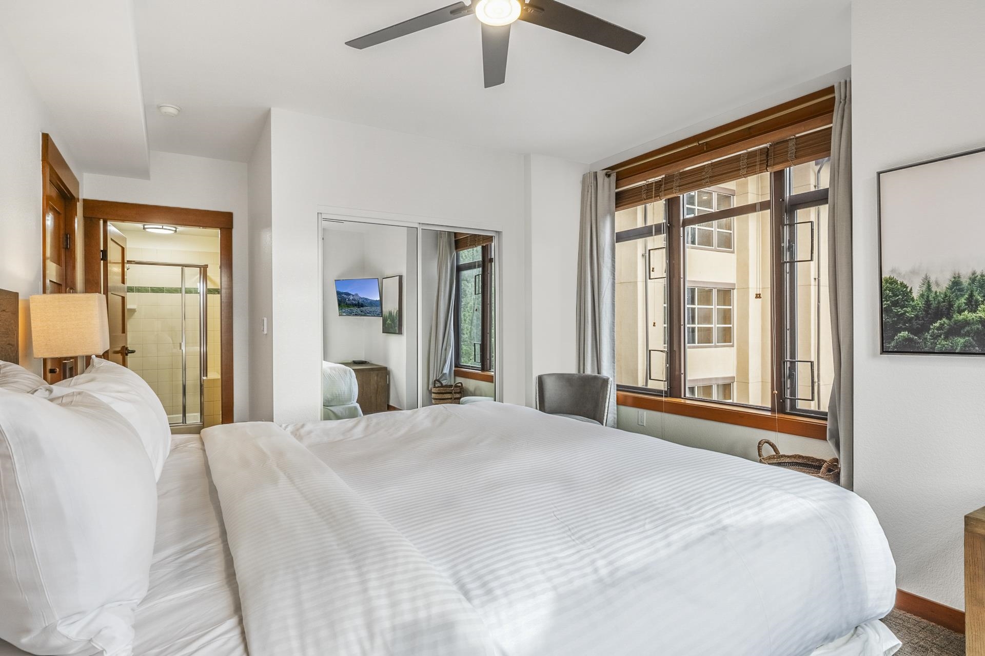 6201 Minaret Road, Unit 2311 Mammoth Lakes, CA 93546 - Photo 15 of 40 a bedroom with a large bed and a large window