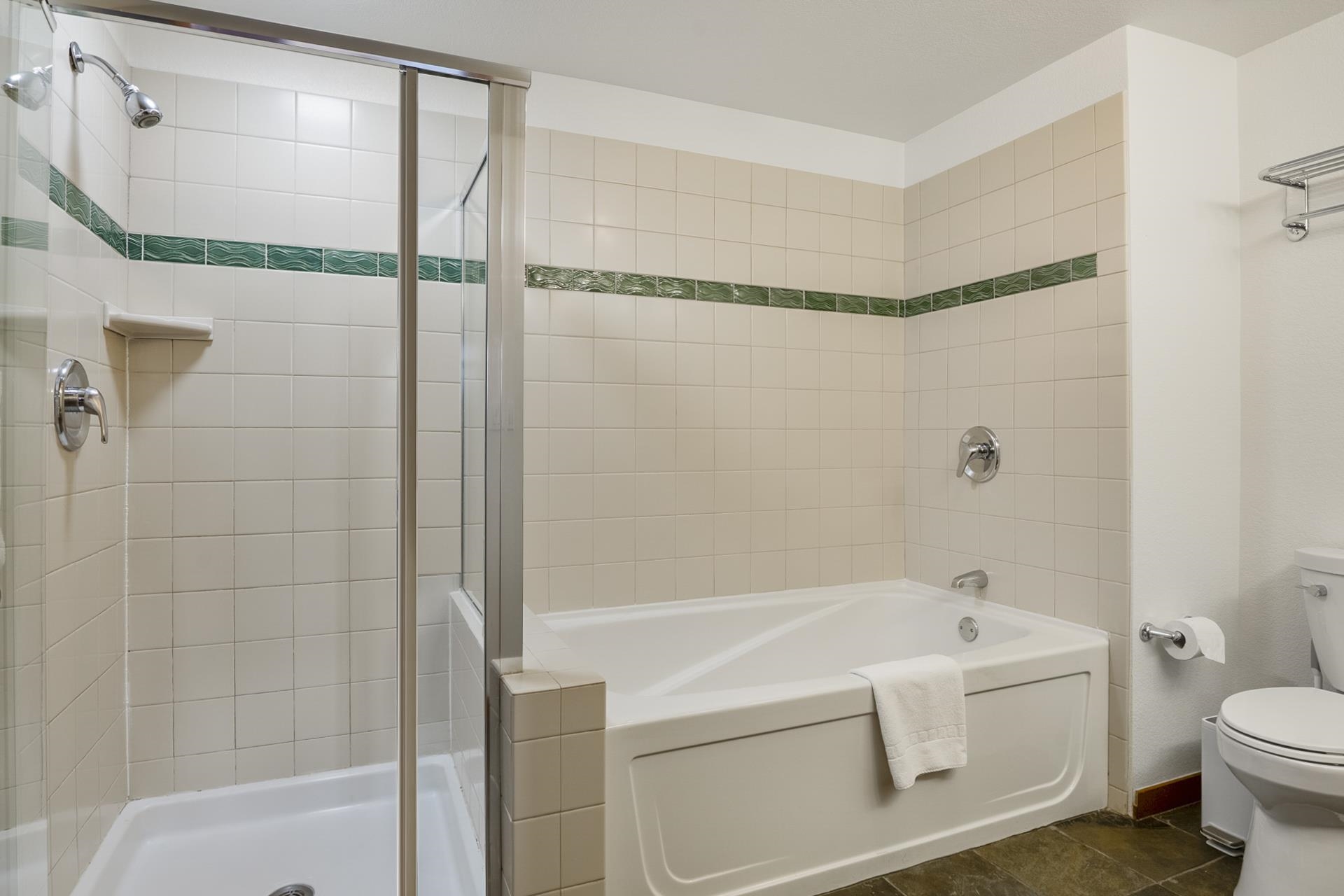 6201 Minaret Road, Unit 2311 Mammoth Lakes, CA 93546 - Photo 18 of 40 a bathroom with a bathtub and a shower