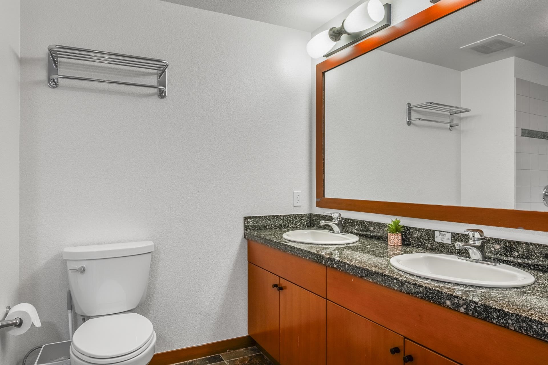 6201 Minaret Road, Unit 2311 Mammoth Lakes, CA 93546 - Photo 20 of 40 a bathroom with a granite countertop sink toilet and shower