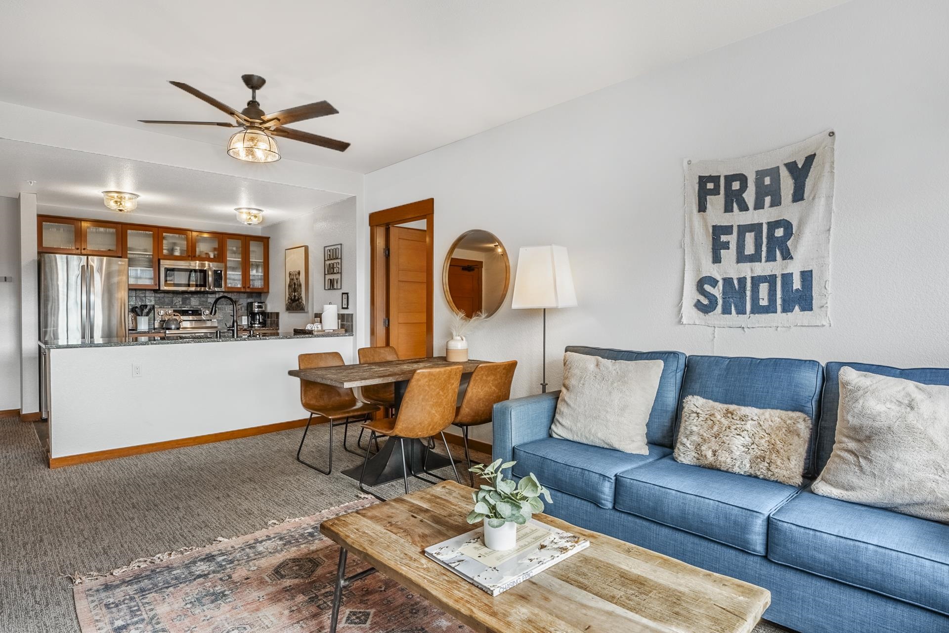 6201 Minaret Road, Unit 2311 Mammoth Lakes, CA 93546 - Photo 5 of 40 a living room with furniture kitchen view and a window