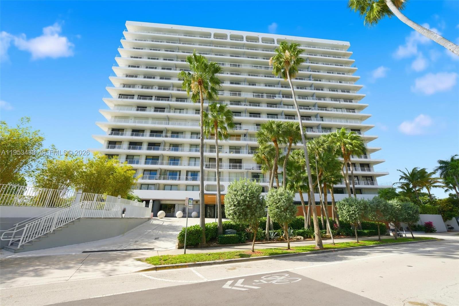 200 Southeast 15th Road, Unit 11H Miami, FL 33129 - Photo 24 of 25 a view of a tall building next to a road