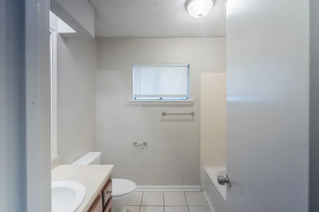 a view of hallway with closet