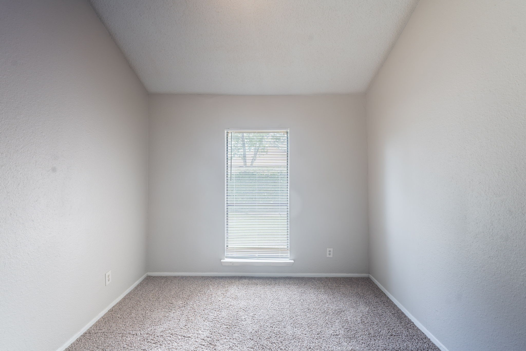 2302 Peaceful Valley Drive Spring, TX 77373 - Photo 32 of 39 a view of an empty room with a window
