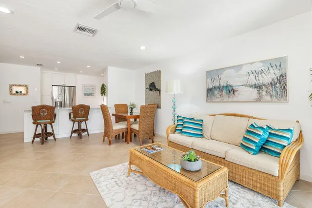 a bedroom with a bed and a table in it