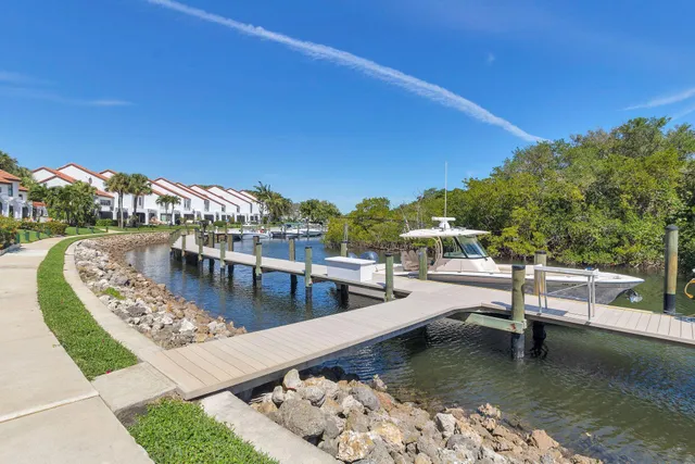 a view of a swimming pool with an outdoor seating