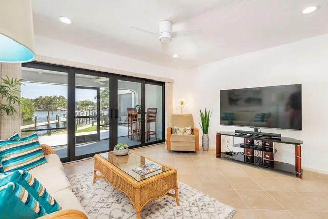 a view of staircase with wooden floor and white walls