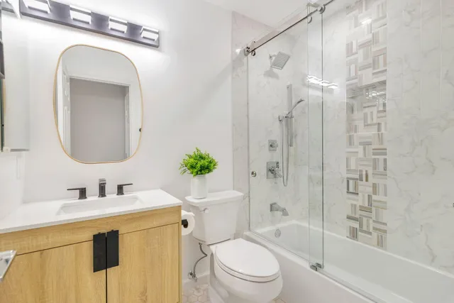 a view of a swimming pool with a lounge chairs