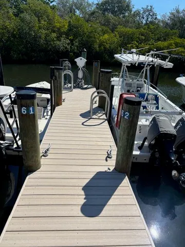 an aerial view of a house with a lake view