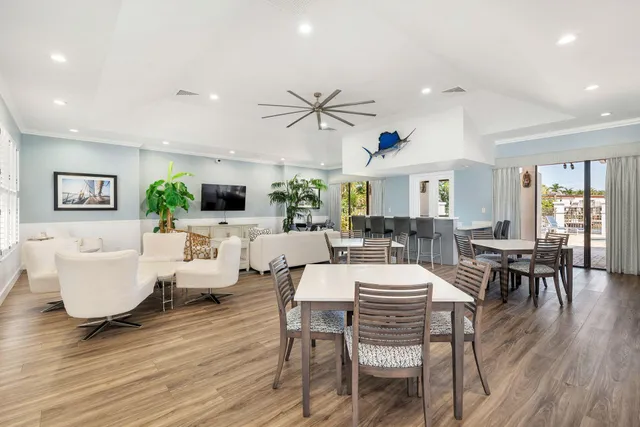 a sign that is in front of flowers