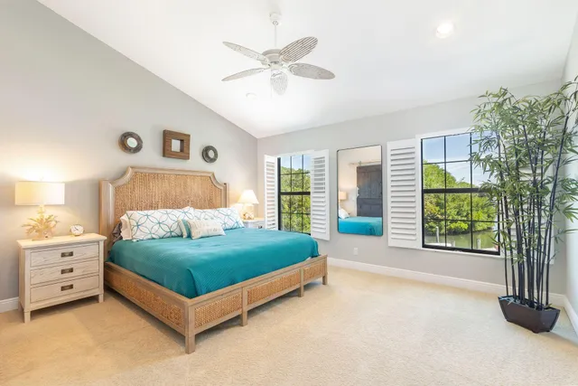 a bathroom with a sink a shower and a mirror