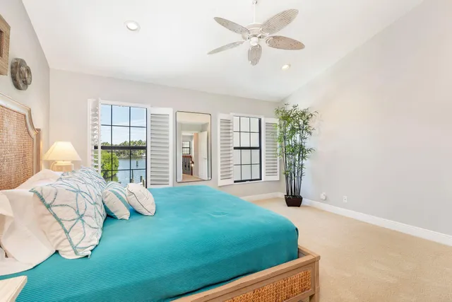 a view of a lake with houses in outdoor space