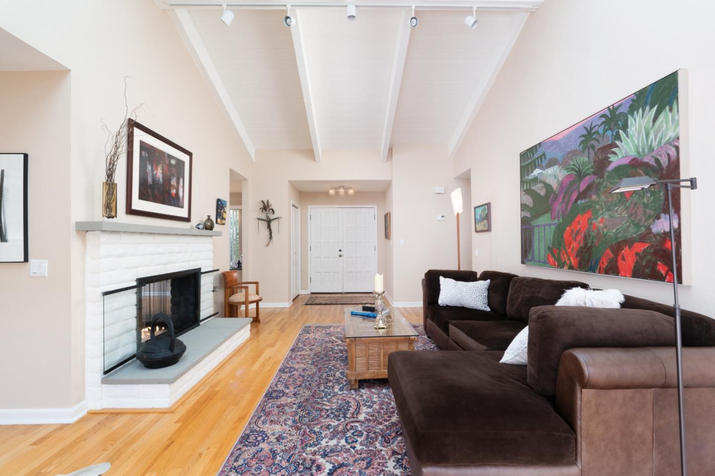 3060 Aztec Road Pebble Beach, CA 93953 - Photo 15 of 38 a living room with furniture and a fireplace