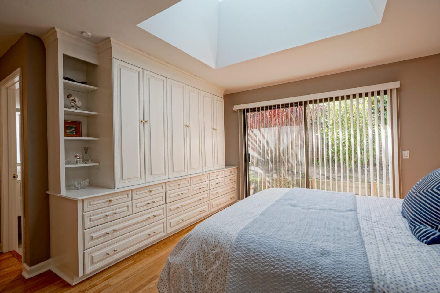 3060 Aztec Road Pebble Beach, CA 93953 - Photo 24 of 38 a bedroom with a bed and a dresser