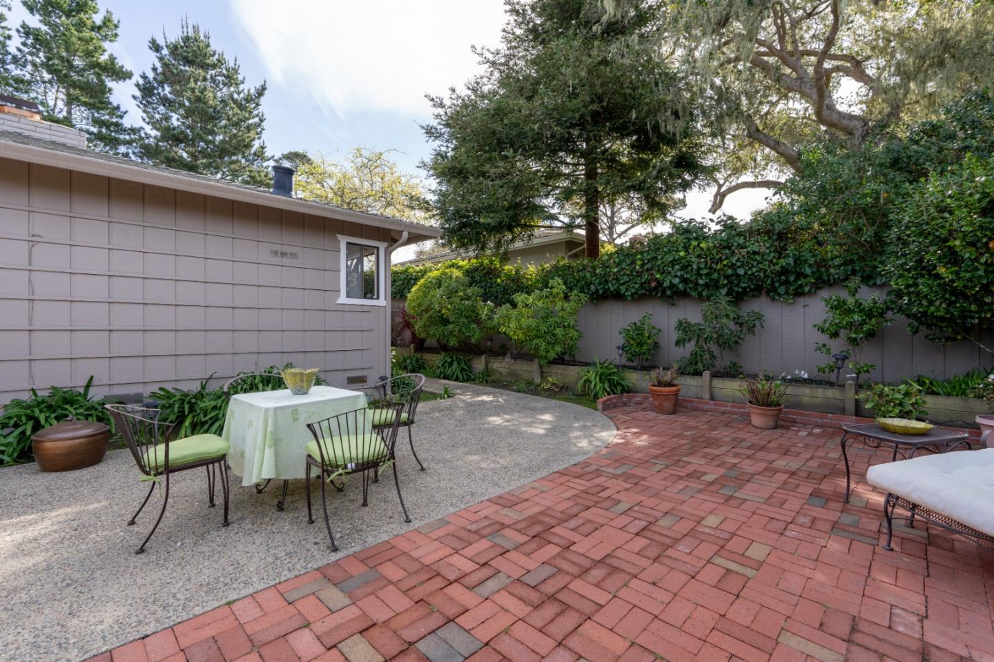 3060 Aztec Road Pebble Beach, CA 93953 - Photo 30 of 38 a view of backyard with outdoor seating and plants