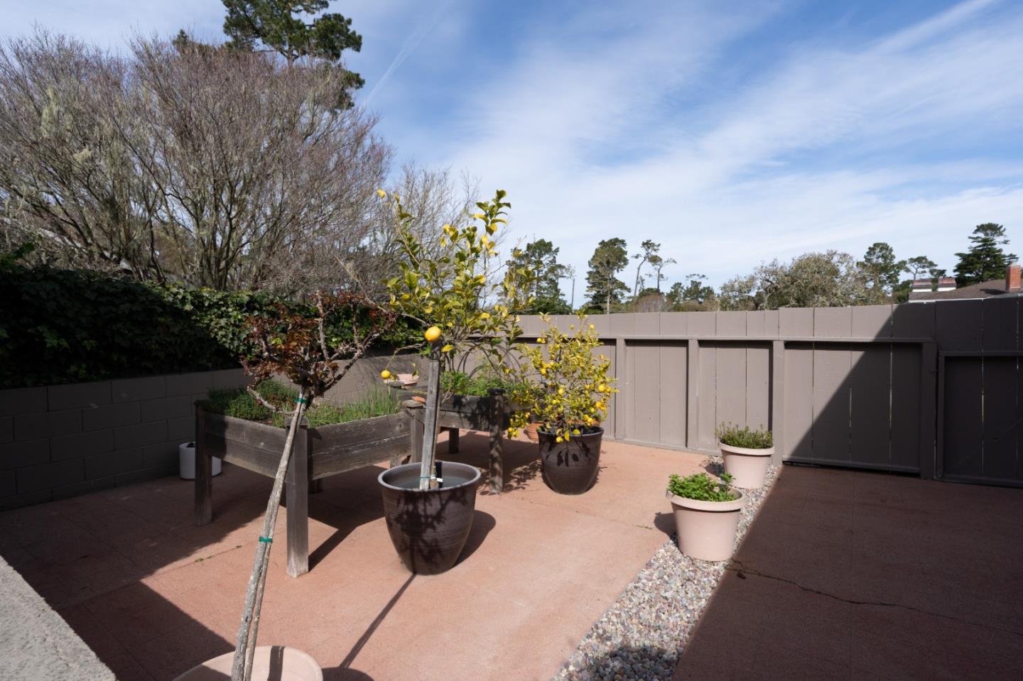 3060 Aztec Road Pebble Beach, CA 93953 - Photo 32 of 38 a view of a terrace with couches and potted plants