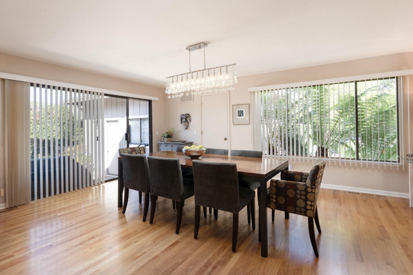 3060 Aztec Road Pebble Beach, CA 93953 - Photo 6 of 38 a view of a dining room with furniture window and wooden floor