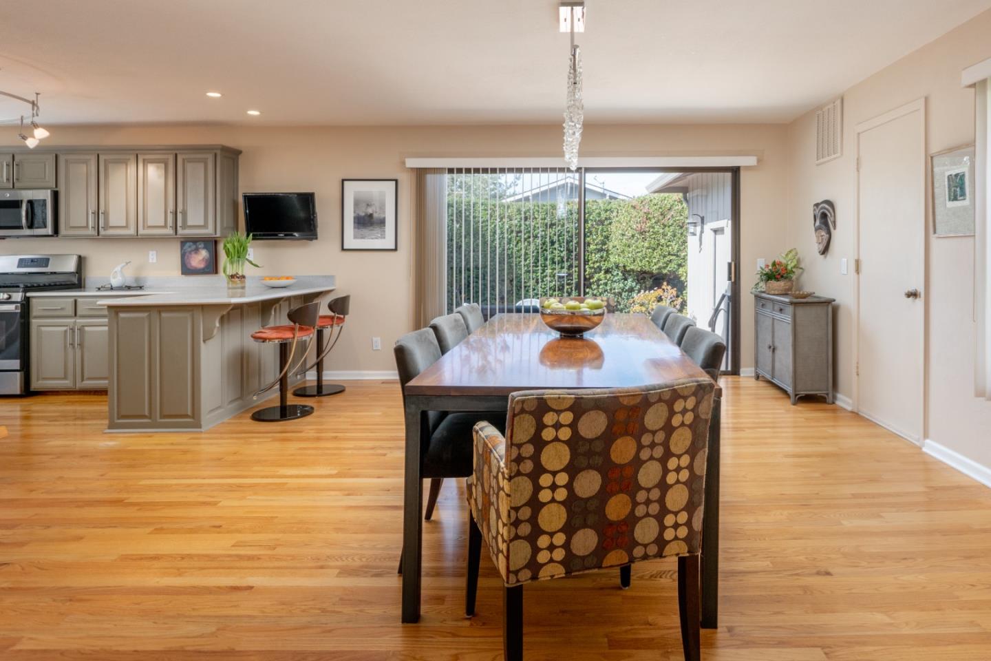 3060 Aztec Road Pebble Beach, CA 93953 - Photo 10 of 38 a view of a dining room with furniture window and wooden floor