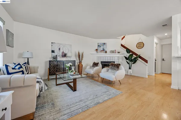 a living room with furniture and a table
