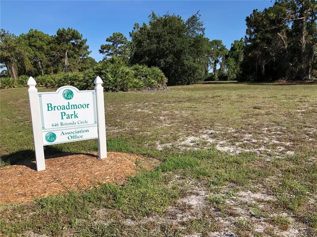 a view of swimming pool with a yard