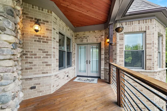 a bed room with a bed and a chair