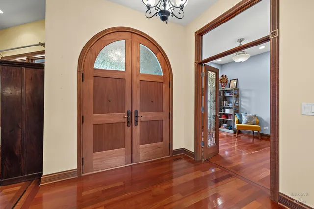 a building outdoor space with patio furniture and potted plants