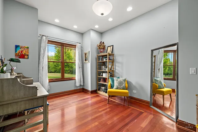 a view of outdoor dining space with a table and chairs