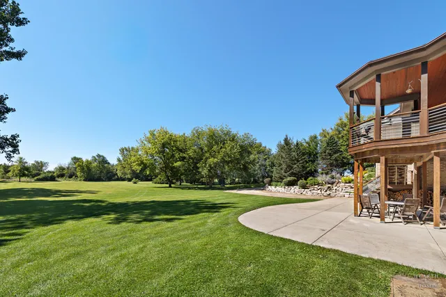 a view of room with window and ceiling fan