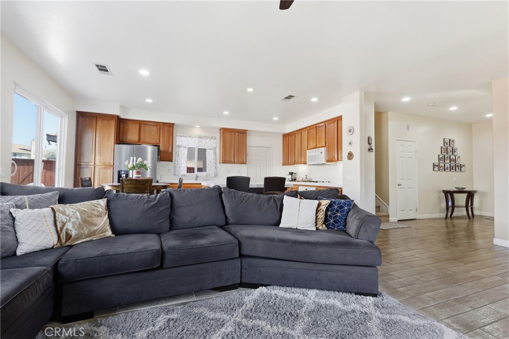 3609 Pyramid Trail Perris, CA 92570 - Photo 12 of 40 a living room with furniture and a view of kitchen