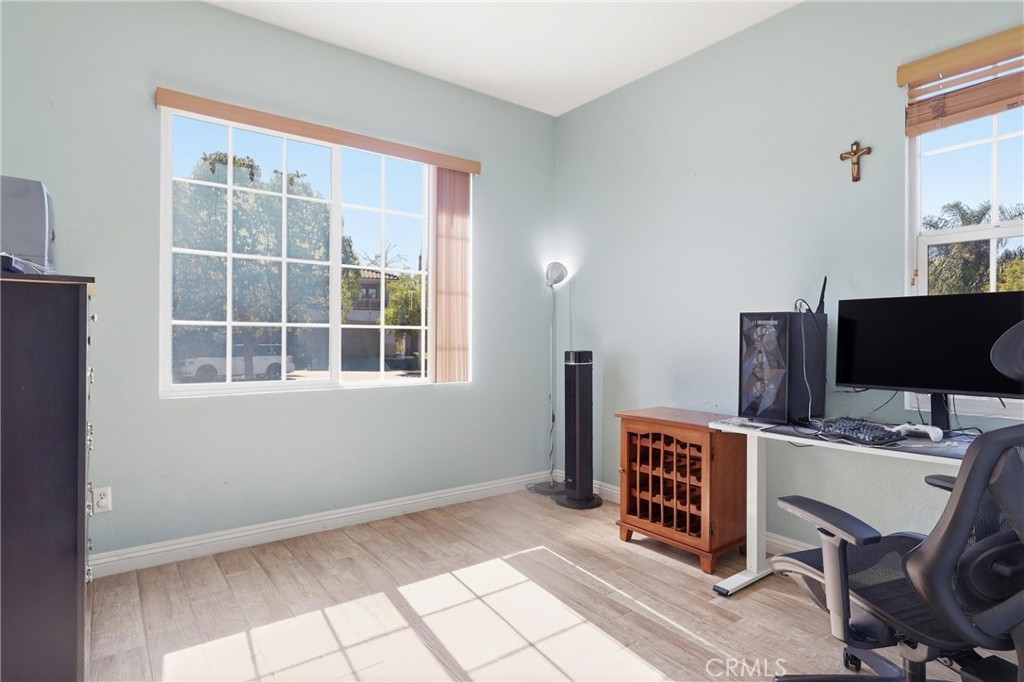 3609 Pyramid Trail Perris, CA 92570 - Photo 19 of 40 a workspace with furniture and window