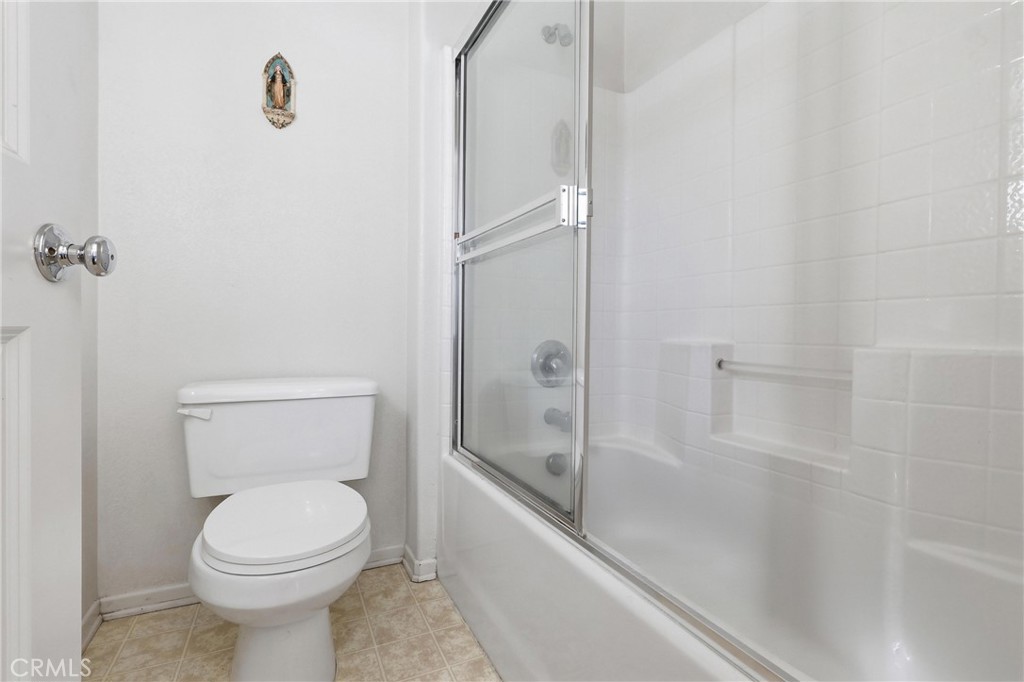 3609 Pyramid Trail Perris, CA 92570 - Photo 26 of 40 a bathroom with a toilet and a shower