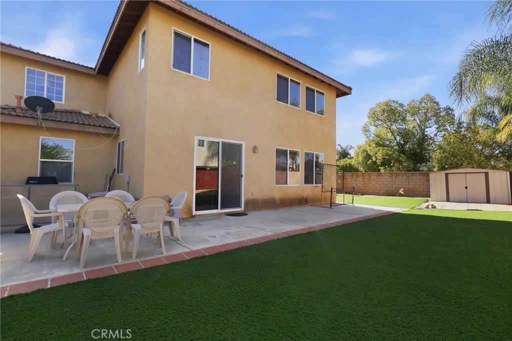 3609 Pyramid Trail Perris, CA 92570 - Photo 34 of 40 a front view of house with yard and outdoor seating