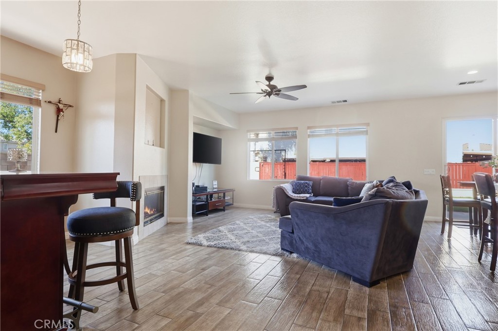 3609 Pyramid Trail Perris, CA 92570 - Photo 8 of 40 a living room with furniture and a chandelier