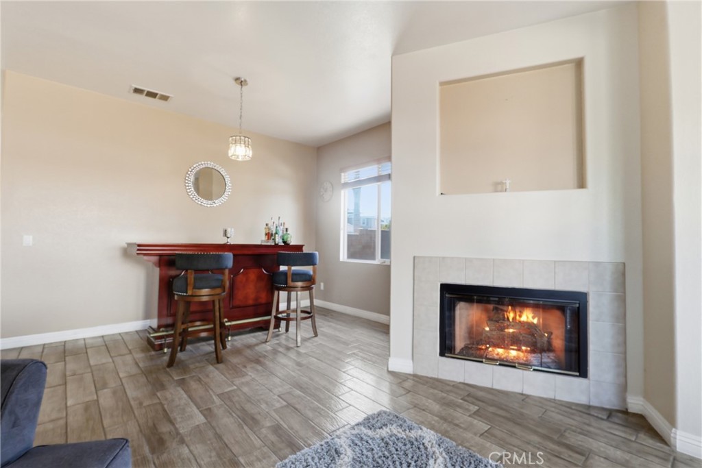 3609 Pyramid Trail Perris, CA 92570 - Photo 9 of 40 a room with furniture and a fireplace