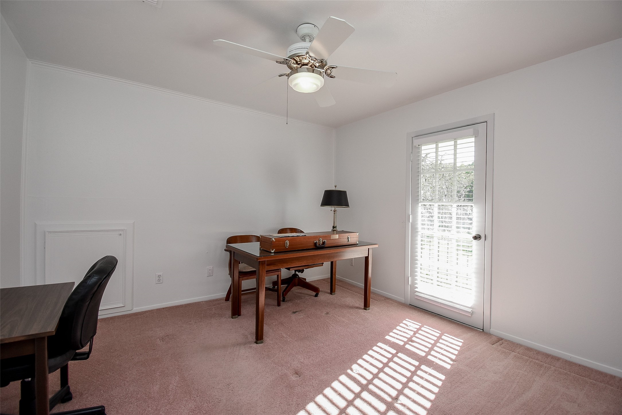 24640 Macedonia Road Hockley, TX 77447 - Photo 23 of 46 a view of a workspace with furniture and a window