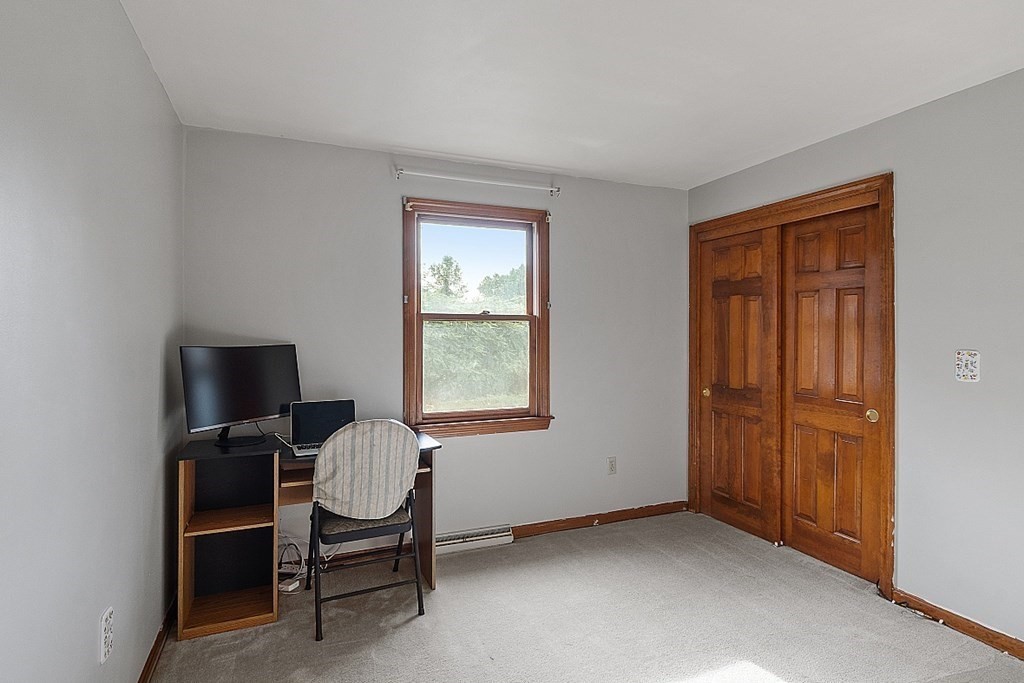 97 Riverview Boulevard Methuen, MA 01844 - Photo 15 of 30 a view of a workspace with furniture and a window