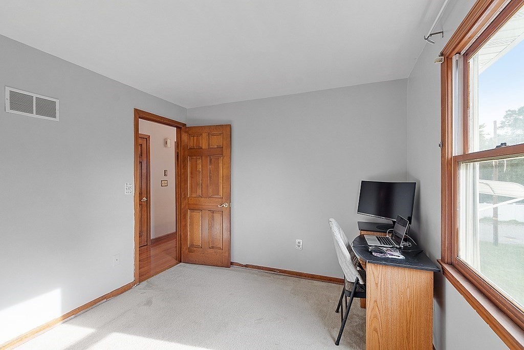97 Riverview Boulevard Methuen, MA 01844 - Photo 16 of 30 a view of a workspace with furniture and a window