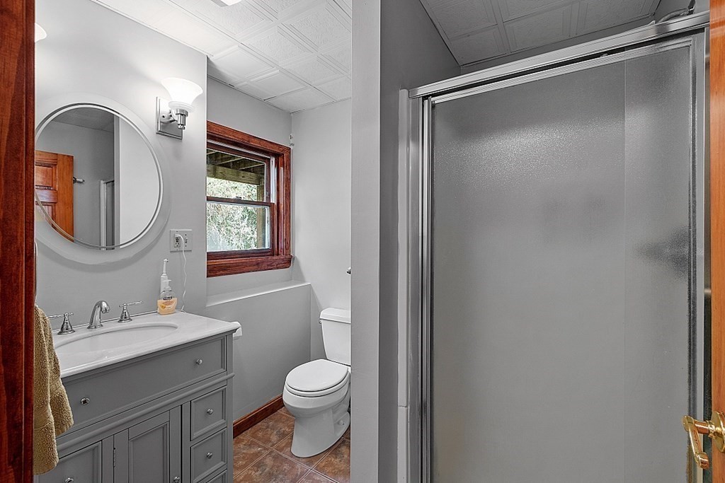 97 Riverview Boulevard Methuen, MA 01844 - Photo 21 of 30 a bathroom with a toilet a sink and a mirror